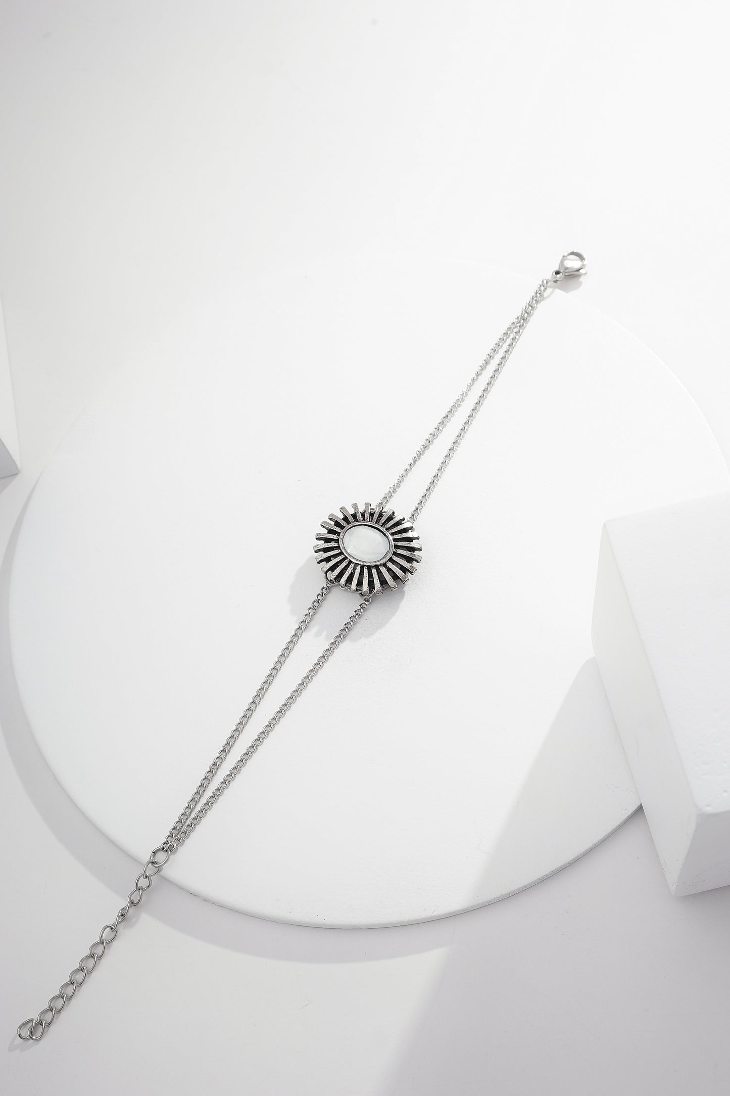 Pulseira peça sol off white com corrente de aço inox