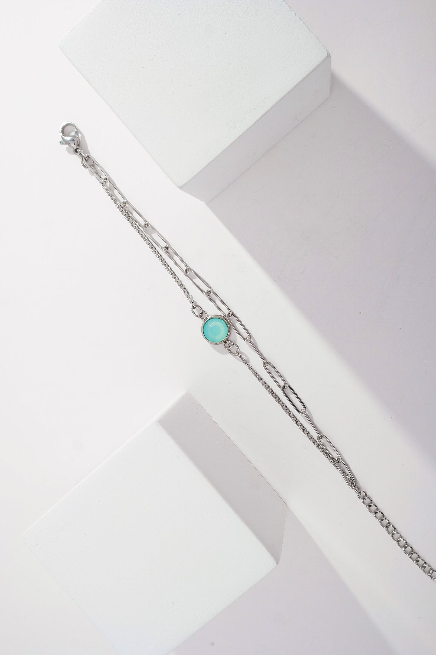 Pulseira dupla azul mar e corrente cartier larga toda de aço