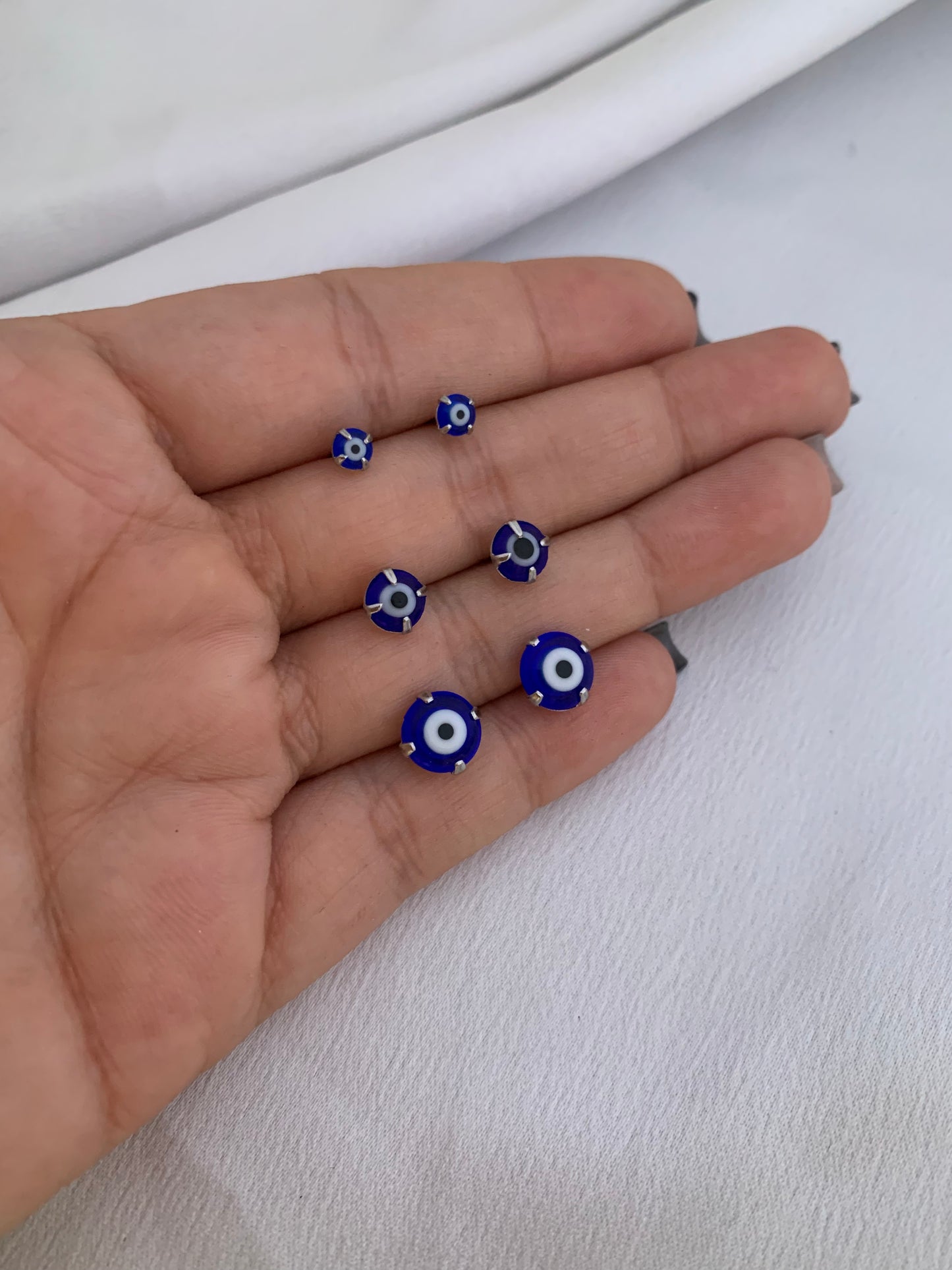 Brinquinho olho grego azul de aço inox - Antialérgicos