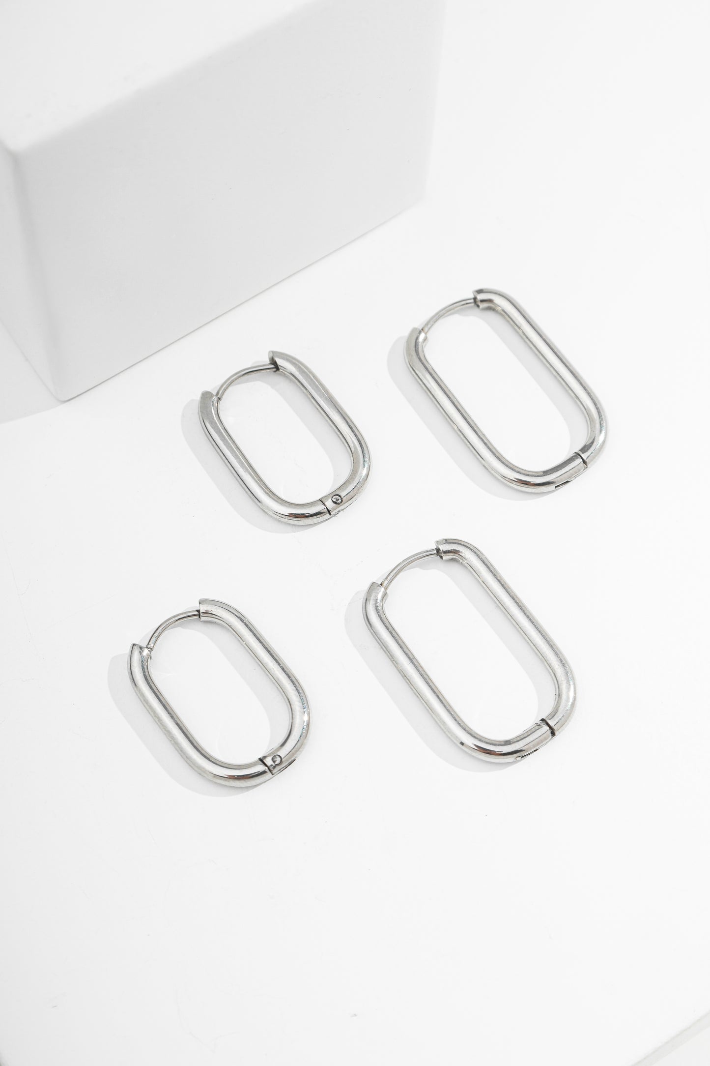 Argola oval trava clique M e G aço inox
