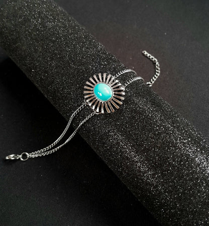 Pulseira peça sol com chaton azul turquesa