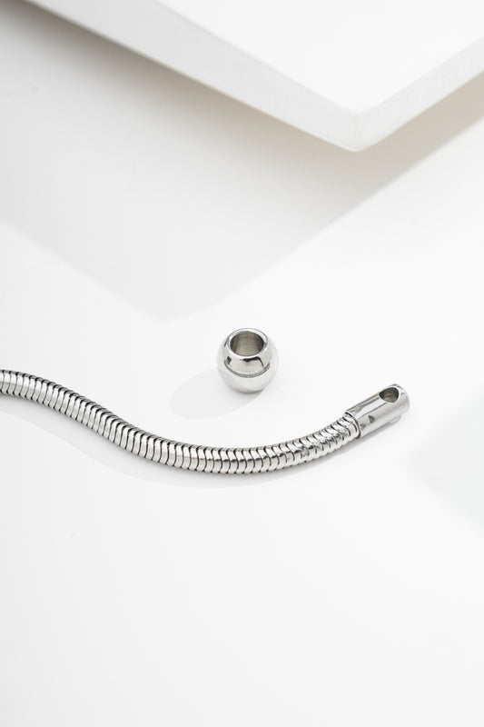 Berloque passador bolinha 8x4mm de aço